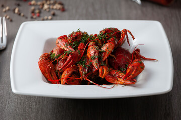 Boiled crawfish on a square plate