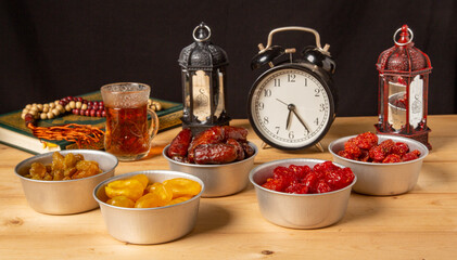 Ramadan food Sweets mixed of dried fruits , Dates premium dates, 
full of date fruits, Arabic coffee, Concept: month fasting culture Muslim prayer, 
1444 Puasa Ramadan Kareem greeting festival 