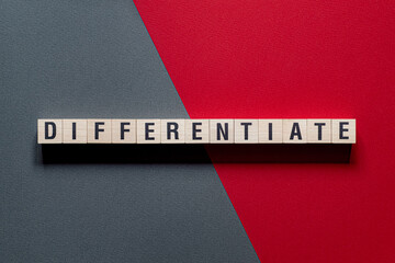 Differentiate - word concept on cubes