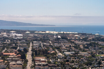 Aerial view of the El Segundo Neighborhood, the Hyperion SAFE Center and the tanks of the Hyperion Water Reclamation plant in Greater Los Angeles, California, USA.   © John McAdorey