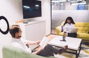 Diverse colleagues during workday in office
