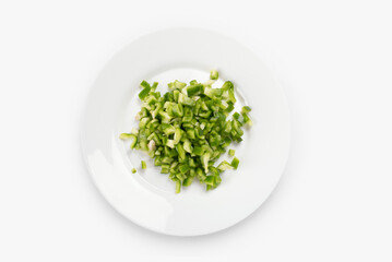 Sliced green pepper on a plate. Organic and healthy food. Seasonal vegetables.