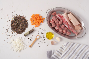 Pork meat, ribs and sausage recipe. Spices, carrots, garlic, herbs. Mediterranean cuisine. Ready to be cooked.