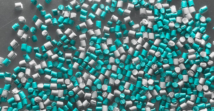 Close up picture of color masterbatch pellets, selective focus.