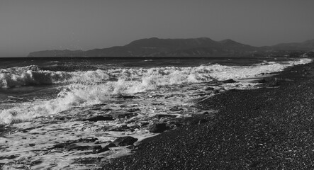 East shore of Rhodes Island with big waves and rocky beach