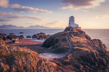 Tŵr Mawr Lighthouse, Ynys Llanddwyn,  Anglesey, Wales, United Kingdom Landscape Stock Photo - obrazy, fototapety, plakaty