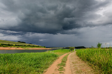 Fototapeta na wymiar landscape with road, storm, cloud day, rain, gray clouds