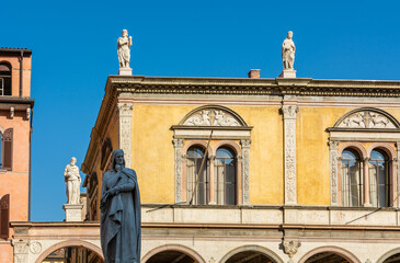 marble statue of Dante Alighieri, the major Italian poet in Piazza dei Signori square, Verona, Veneto region, northern Italy, Europe