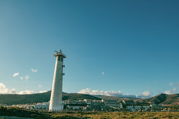 Lighthouse on Morro Jable beach on Jandia peninsula in sunset light, Fuerteventura, Canary Islands, Spain
