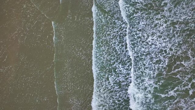 Flight above the waves. Dunkirk beach. cinematic flight