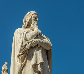 marble statue of Dante Alighieri, the major Italian poet in Piazza dei Signori square, Verona, Veneto region, northern Italy, Europe