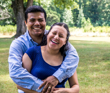 Mexican couple laughing and smiling for the camera