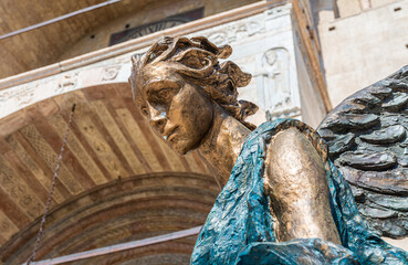Blue angel in front of Verona Cathedral, bronze sculpture by Albano Poli, 2015, Verona Province,...