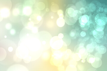 Abstract gradient light blue turquoise yellow green shiny blurred background texture with circular bokeh lights. Beautiful fresh backdrop. Space for design.