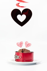 Valentines day muffin with black heart and love