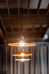 Lamps and chandeliers in the restaurant with warm light