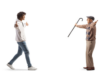 African american young man walking meeting an elderly man with arms wide open
