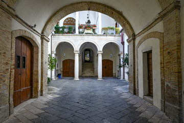 Fototapeta na wymiar The courtyard of a noble palace located in Lucera, an ancient Apulian town in the province of Foggia, Italy..