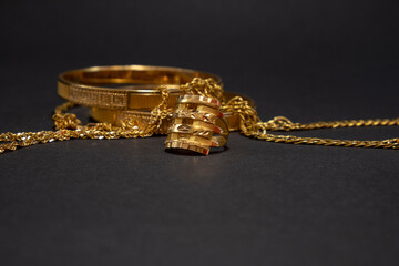 Gold ring with brilliant isolated on black background,jewelry weddingring diamond and gold luxury...