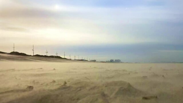 Sanstorm on a Dunkirk beach. Windy day