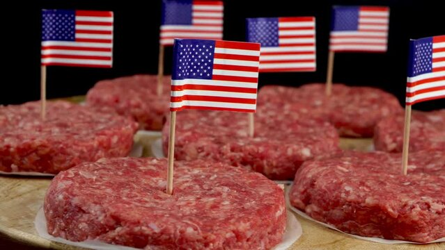 Round fresh raw mince beef burger cutlets.