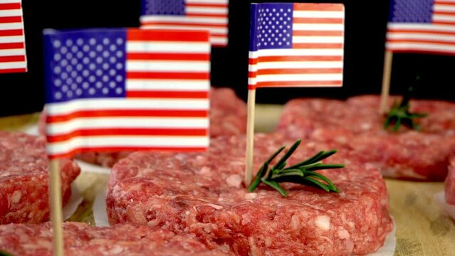 Round fresh raw mince beef burger cutlets.