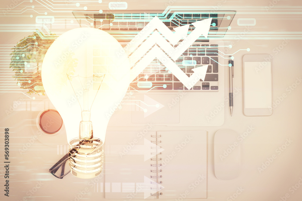 Poster Bulb drawing over computer on the desktop background. Top view. Double exposure. Idea concept.