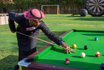 The Saudi Man wearing the traditional dress 