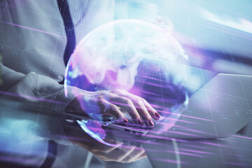 Double exposure of woman hands typing on computer and technology theme drawing. High Tech concept.