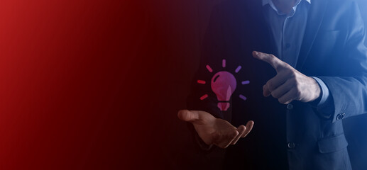 Hand holding light bulb. Smart idea icon isolated. Innovation, solution icon. Energy solutions. Power ideas concept. Electric lamp, technology invention. Human palm. Business inspiration.