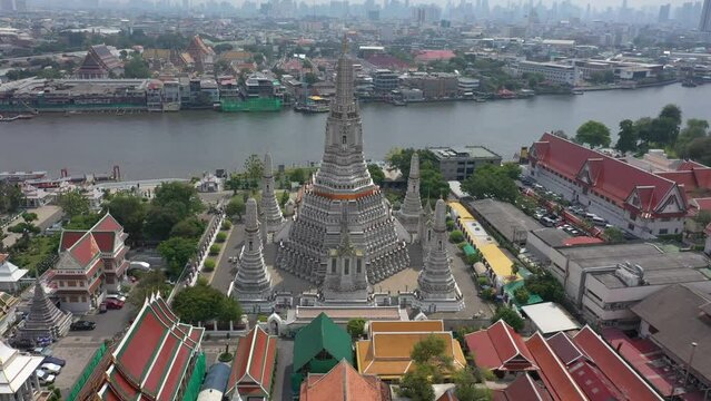 Aerial video of Wat Arun or Arun temple located in Bangkok of Thailand. 