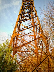 Old metal truss construction of power line support