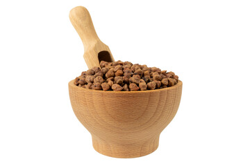 brown chickpeas in wooden bowl and scoop isolated on white background. nutrition. food ingredient.