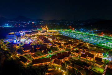 Colorful aerial view of Legend Siam with symphony light show at night, Pattaya Thailand. Select focus.
