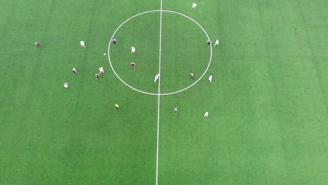 Top View Football Field, Amateur Adult Teams Playing