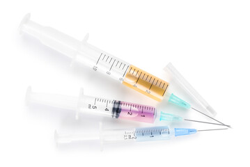 Medical syringes with remedy on white background