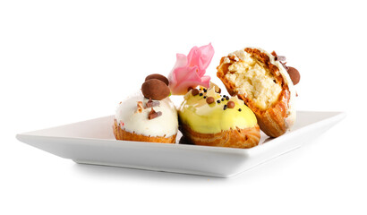 Plate with delicious eclairs isolated on white background