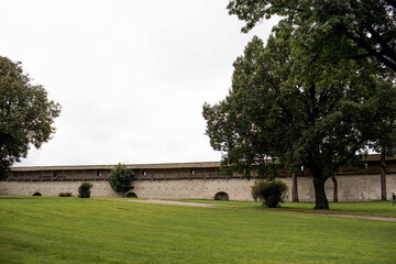 Panoramic view of the medieval Pskov Kremlin on the island in cloudy weather, Russia, city. Pskov