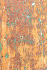 pattern of grunge wall in different colors on a wooden background