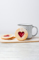 Heart Shaped Jam Filled Cookies and Mug, Linzer Cookies, Romantic Love Concept