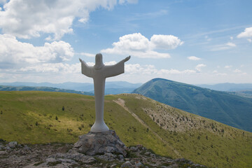 View of the statue of Jesus in the national park of Monti Sibillini, Marche