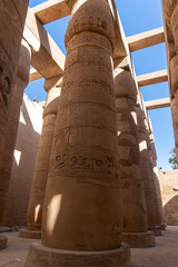 Columns of the Karnak temple in Luxor, without people and on a sunny day.