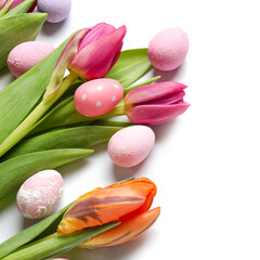 Fototapeta premium Beautiful tulip flowers and Easter eggs on white background