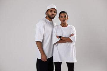 African american couple in white t-shirts. Man in white panama. Mock-up.