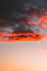 Amazing sunset sky with colourful dramatic clouds.