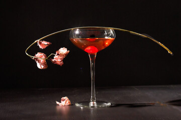 glass of wine with flower