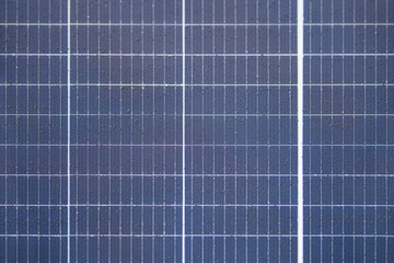 Solar panel texture with raindrops, waterproof solar panel modules, top view, as background or texture