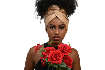 Afro woman with a bouquet of red roses wears a turban on her head