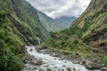 View of Marshyangdi river and Tal village as seen on route of Around Annapurna Trek to Chamje village from Tal village, Lamjung district, Gandaki zone, Nepal Himalayas, Nepal