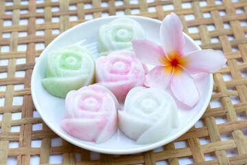Fototapeta na wymiar Coconut milk rose shaped jelly with (salim) Thai sweet dessert
